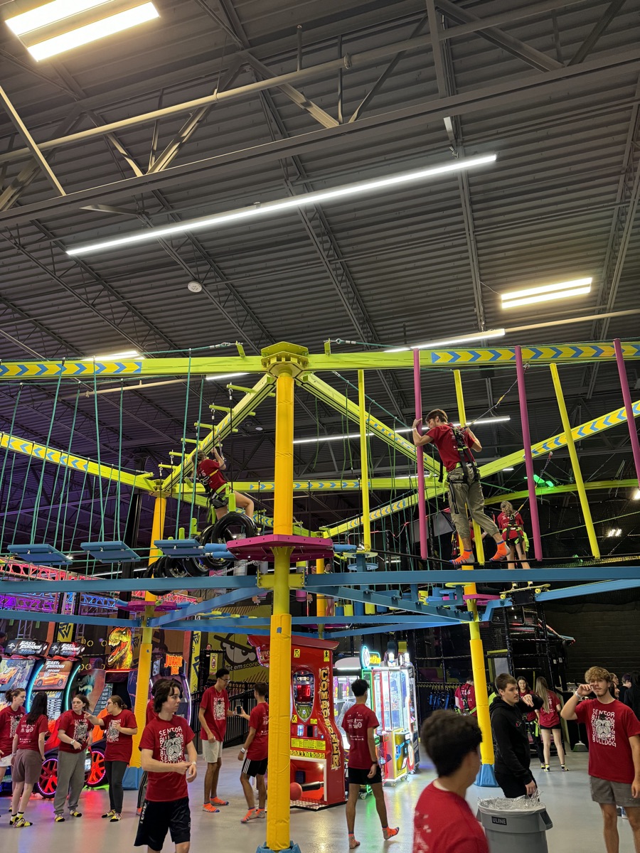 Graduates on the ropes course on Project Graduation night