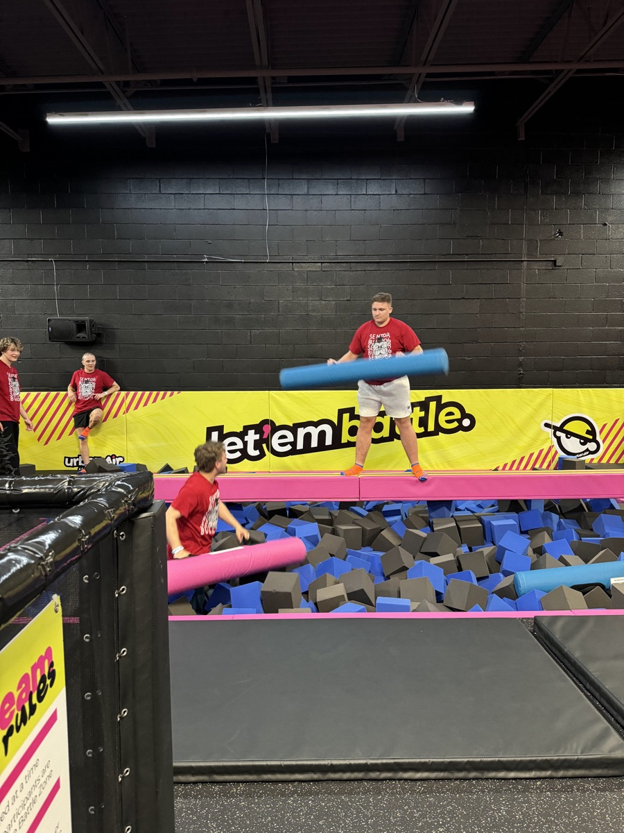 Foam-pit battle between graduates